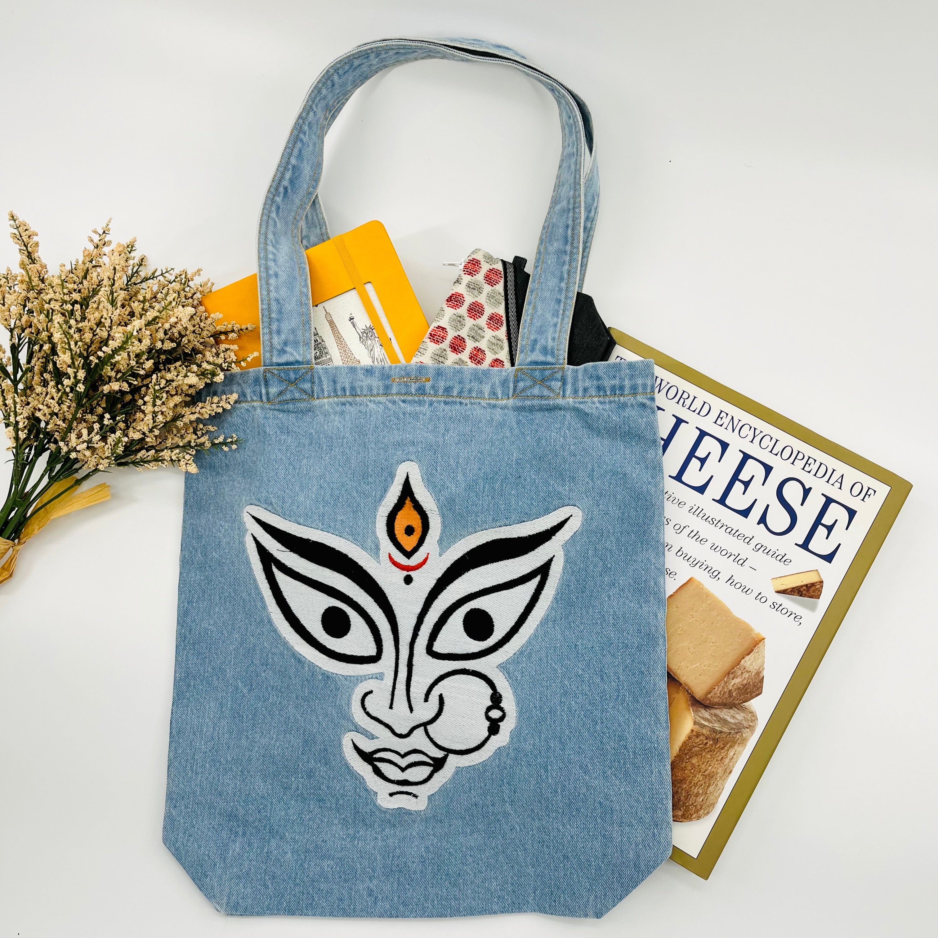 The face of "MAA KALI / Durga" Denim Tote Bag | Light Blue Denim