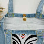 The face of "MAA KALI / Durga" Denim Tote Bag | Light Blue Denim