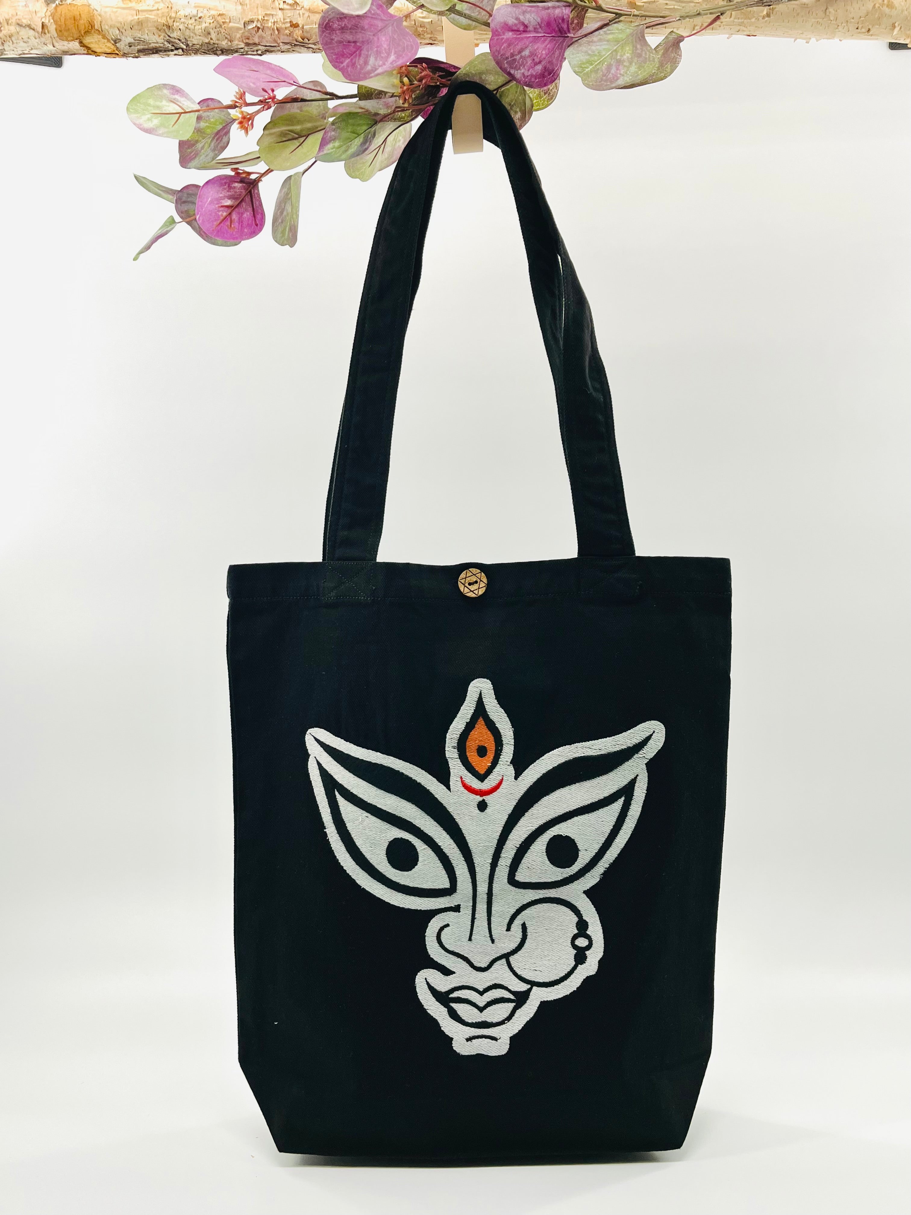 The face of "MAA KALI / Durga" Denim Tote Bag | Black Denim