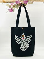 The face of "MAA KALI / Durga" Denim Tote Bag | Black Denim