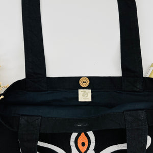 The face of "MAA KALI / Durga" Denim Tote Bag | Black Denim